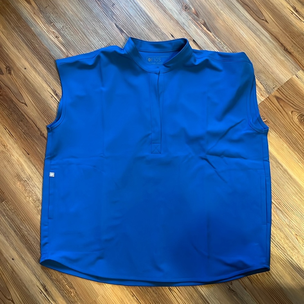 Figs scrub top size large. Royal blue. PO # in the pictures.